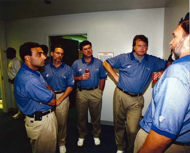 Team Doctors talking with offensive line coach Howard Mudd